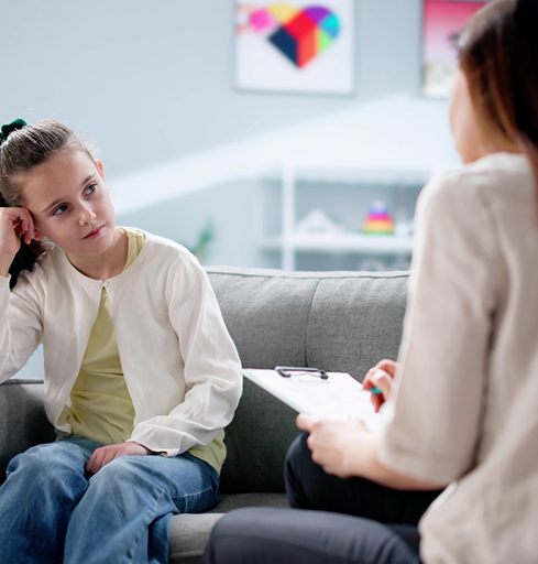Girl talking to medical professional