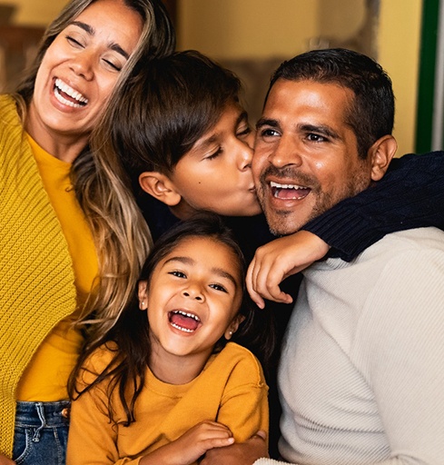 Happy parents with two children