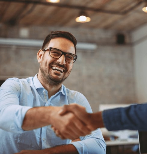 Man shaking hands with therapist