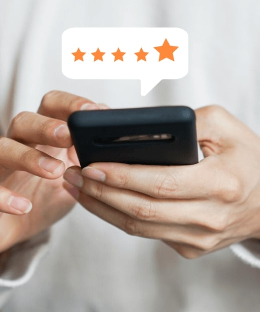 Person writing a review on their smartphone